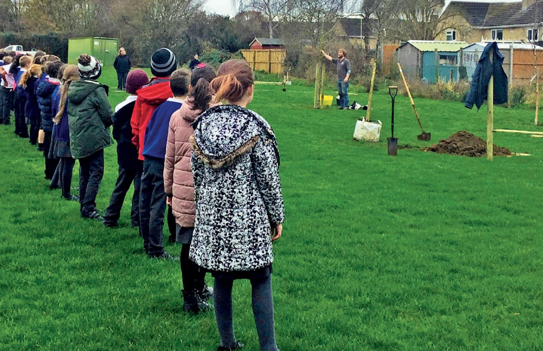 John Parker plants trees to mark the Association’s first school membership