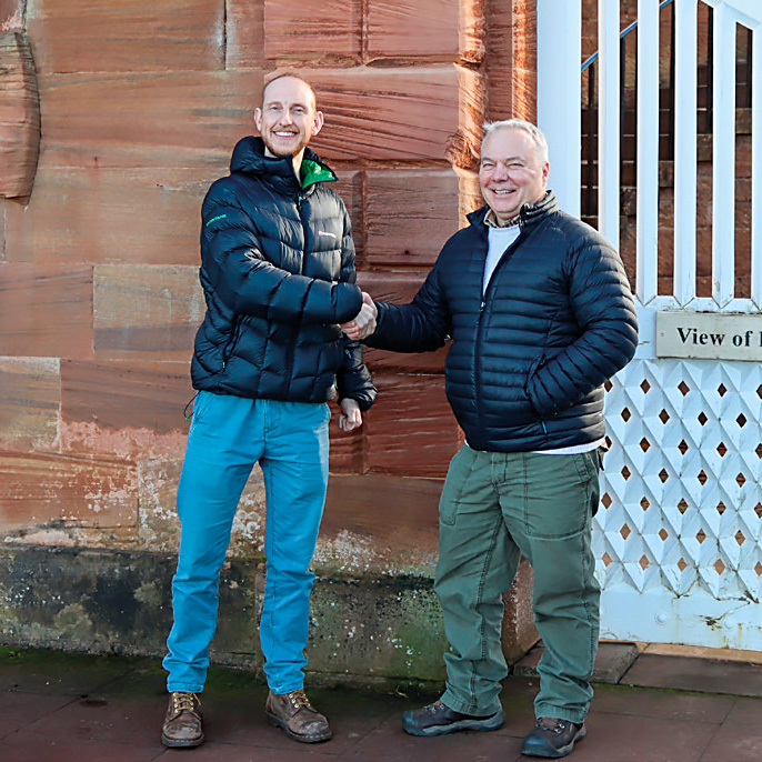 Kevin Frediani (right) receiving the Tom Hall Memorial Literary Prize from Scotland Editor Nick Porter (left).