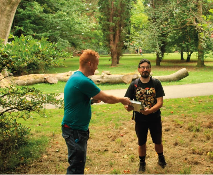 Steve Lucocq presenting a book to Teifion