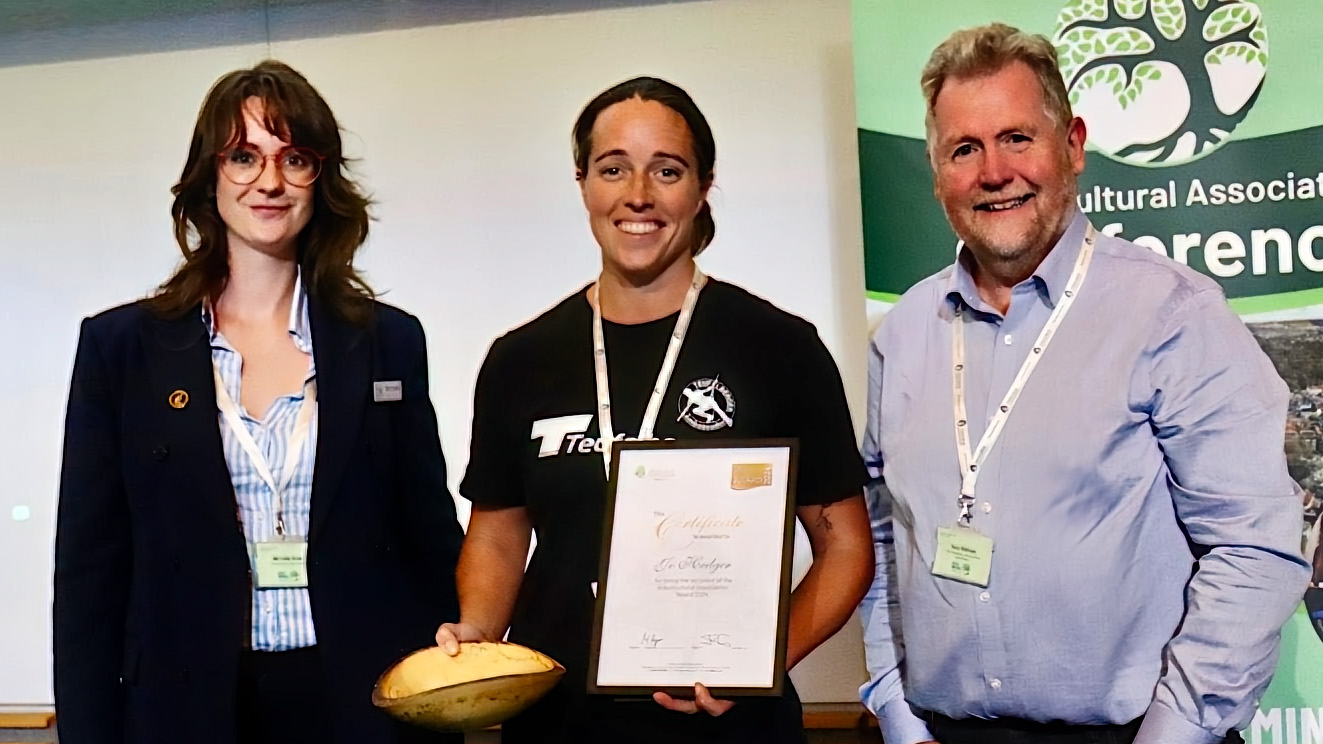 Jo Hedger recieves her award from Michelle Ryan and Tony Kirkham