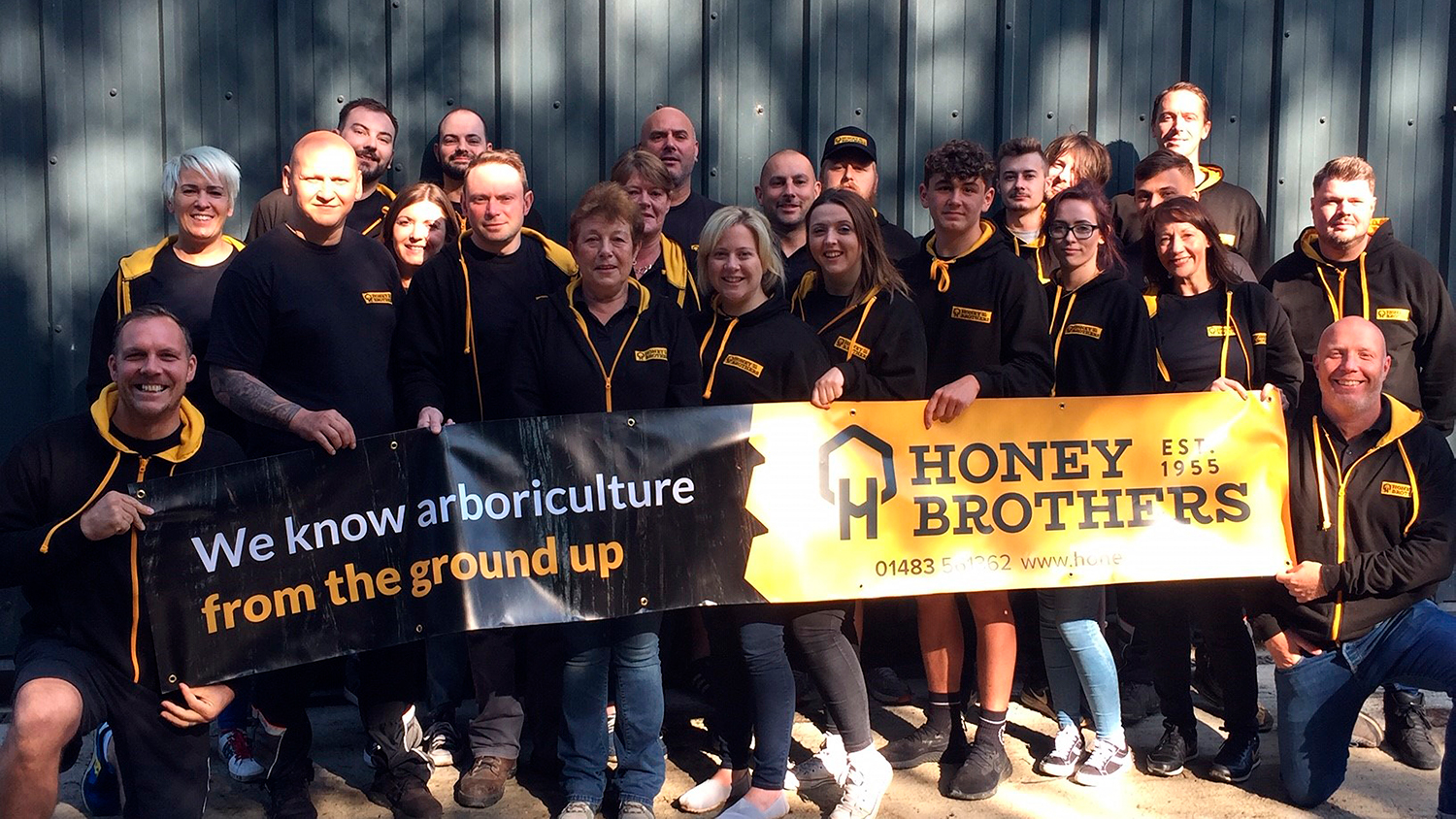 Honey Brothers staff proudly show off new branding
